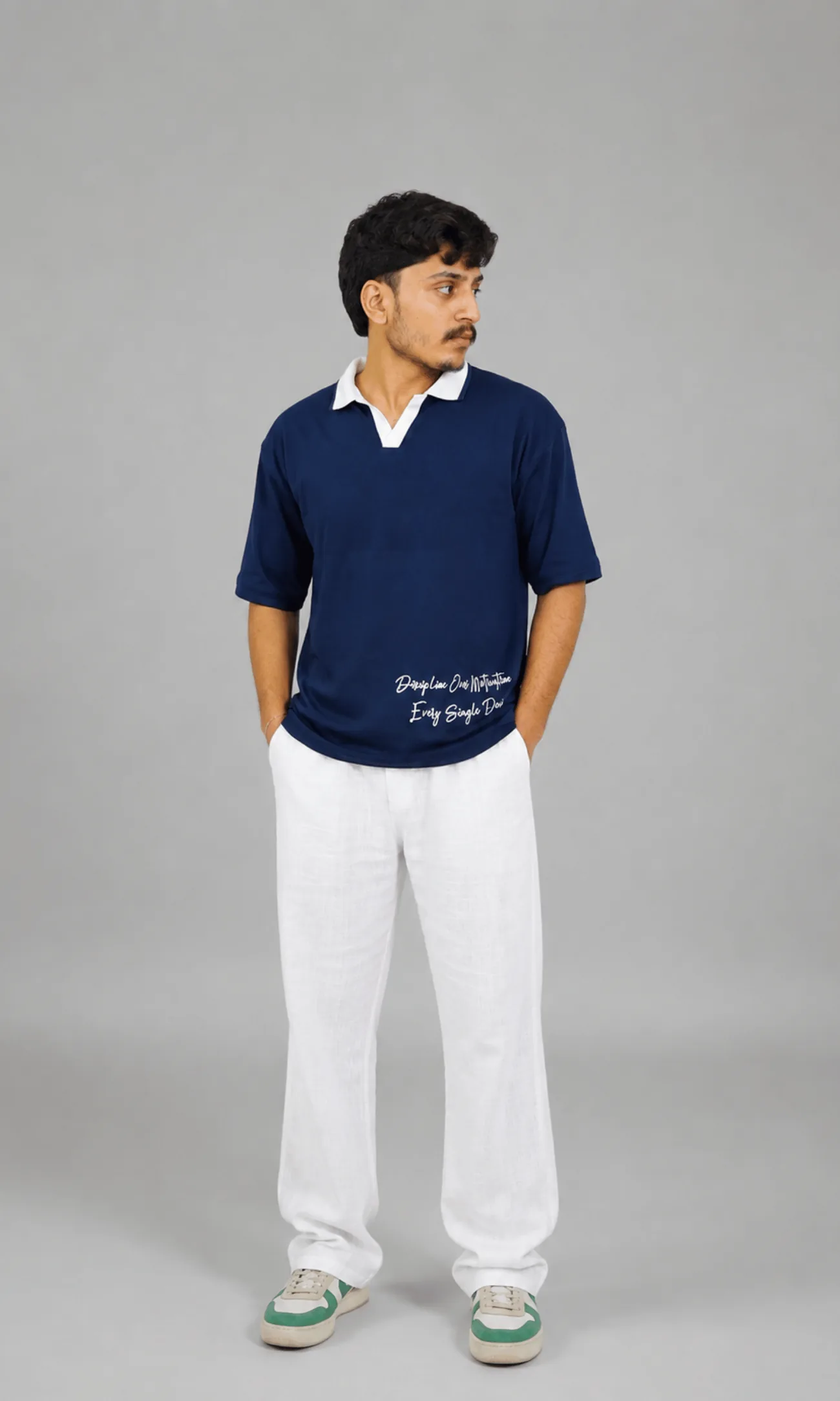 Vega Noir model wearing the Discipline contrast pique polo